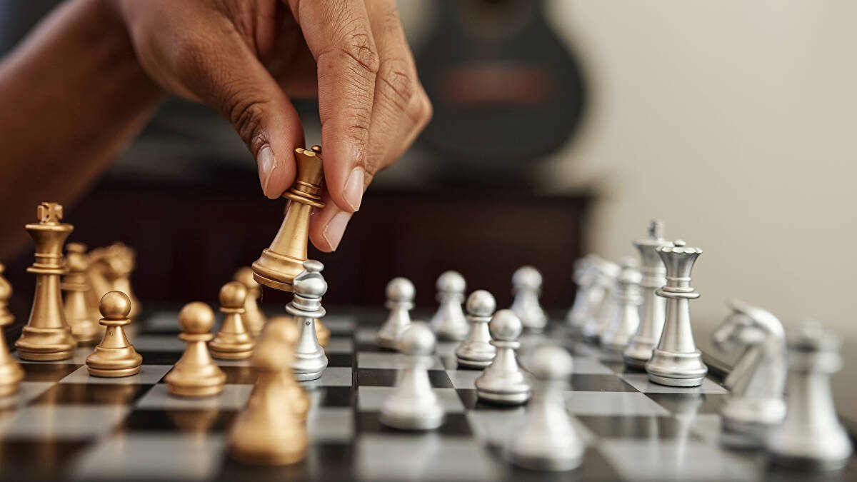 chess playing hand - Karnataka State Chess Association