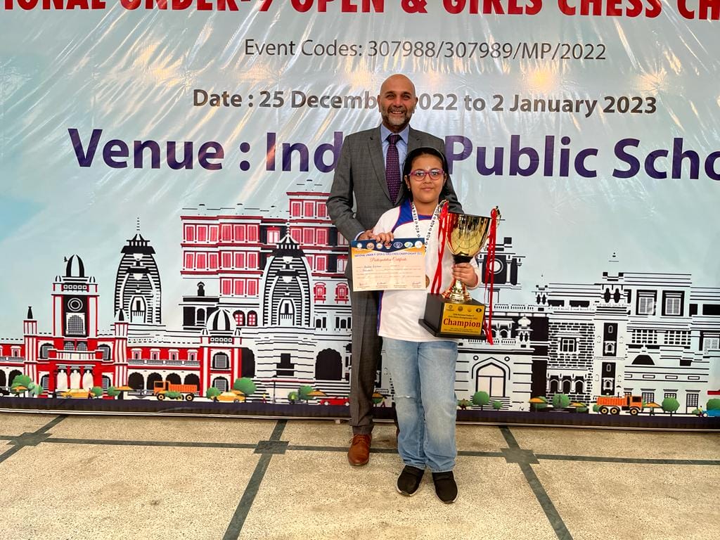 Pratitte with GM Praveen Thispsay - Karnataka State Chess Association