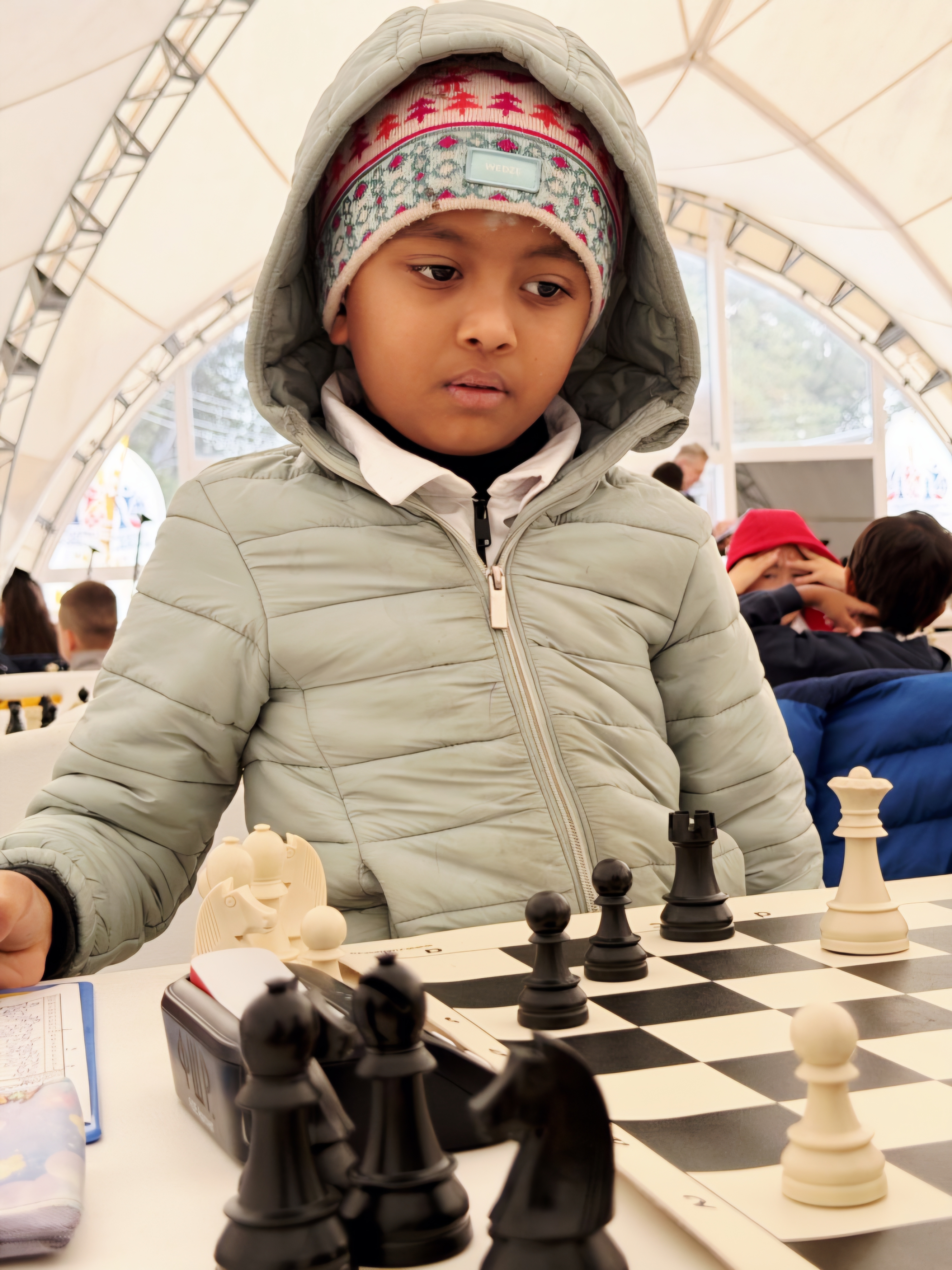 Nimalan in winter gear - Karnataka State Chess Association